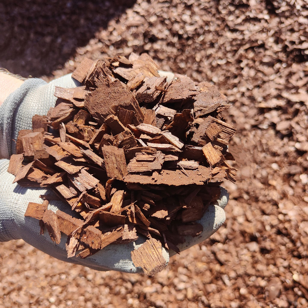 A course wood mulch called Woodland Brown available from Rockingham Soils and Garden Supplies.